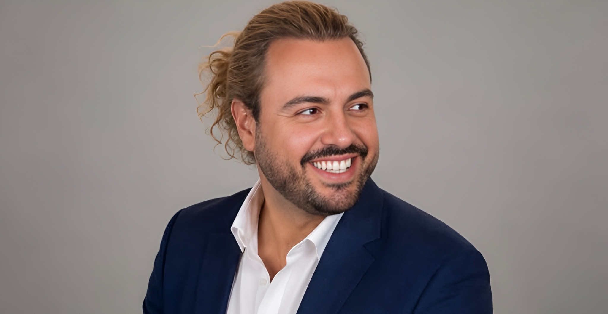 Dr. Theofanis (Fanis) Aritzis smiling and looking to the side